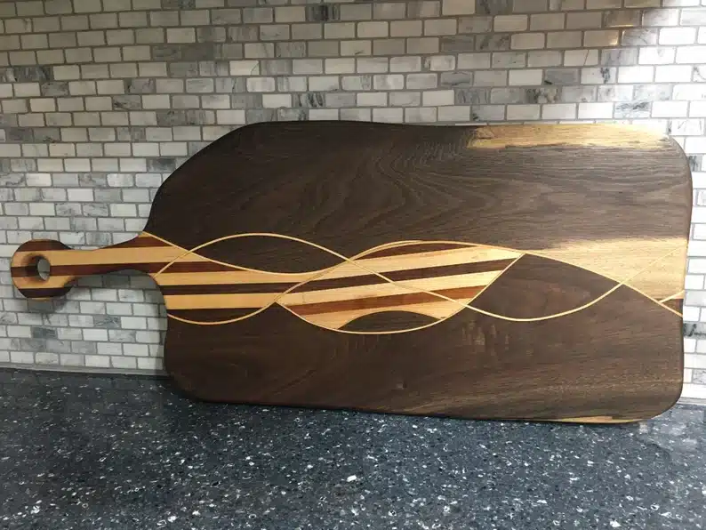 Live-Edge Walnut serving board with hardwood accents